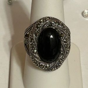 Sterling silver black onyx and marcasite ring.
